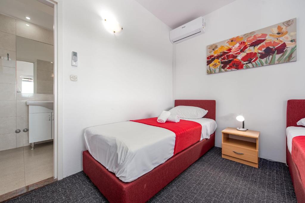 Postel nebo postele na pokoji v ubytování Villa Dandelion ZadarVillas
