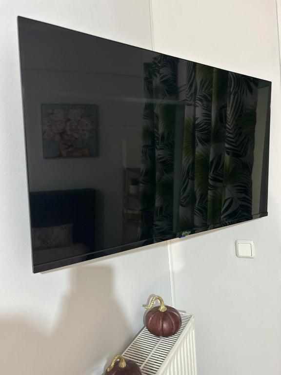 TV a/nebo společenská místnost v ubytování ΒE House