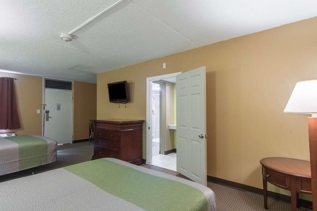 Postel nebo postele na pokoji v ubytování Motel 6 Sherman, TX