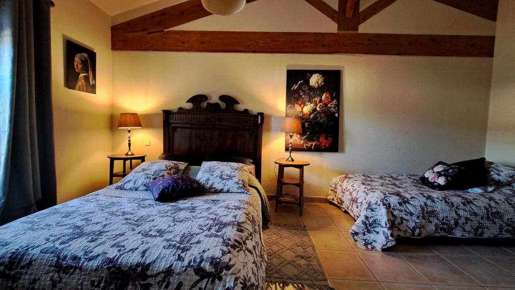 Postel nebo postele na pokoji v ubytování Relais de Laval
