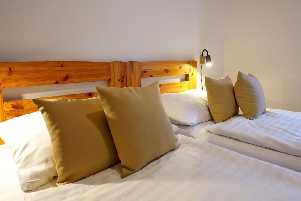 Postel nebo postele na pokoji v ubytování Resort Ohrada
