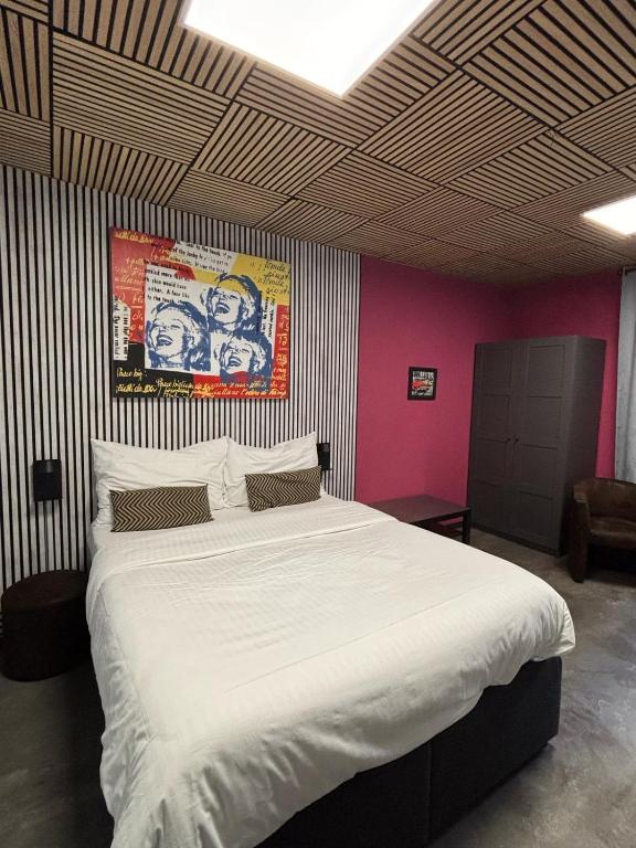 Uma cama ou camas num quarto em Hotel Parc & Lac