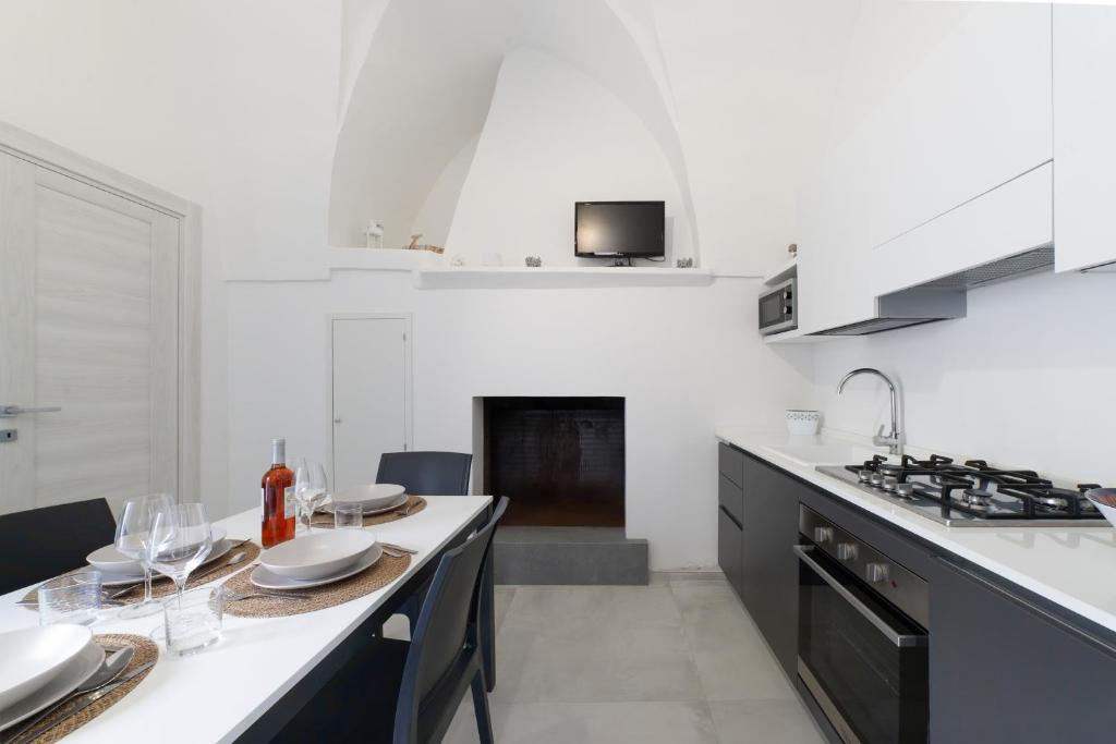 A kitchen or kitchenette at Nara Apartments 1 - Private Jacuzzi