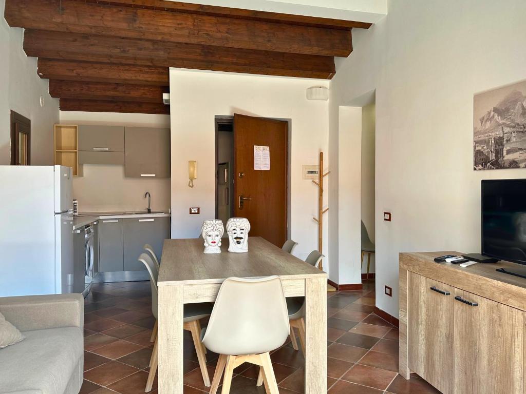 Televízia a/alebo spoločenská miestnosť v ubytovaní Appartamenti-Residence Al Massimo