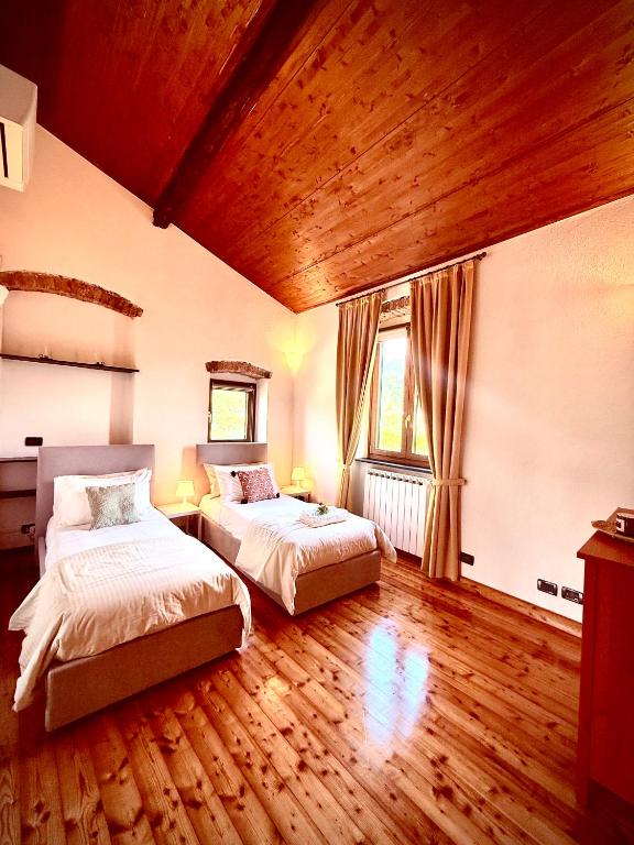 A bed or beds in a room at La Villetta - cozy house with parking, wifi, wall box and air conditioning