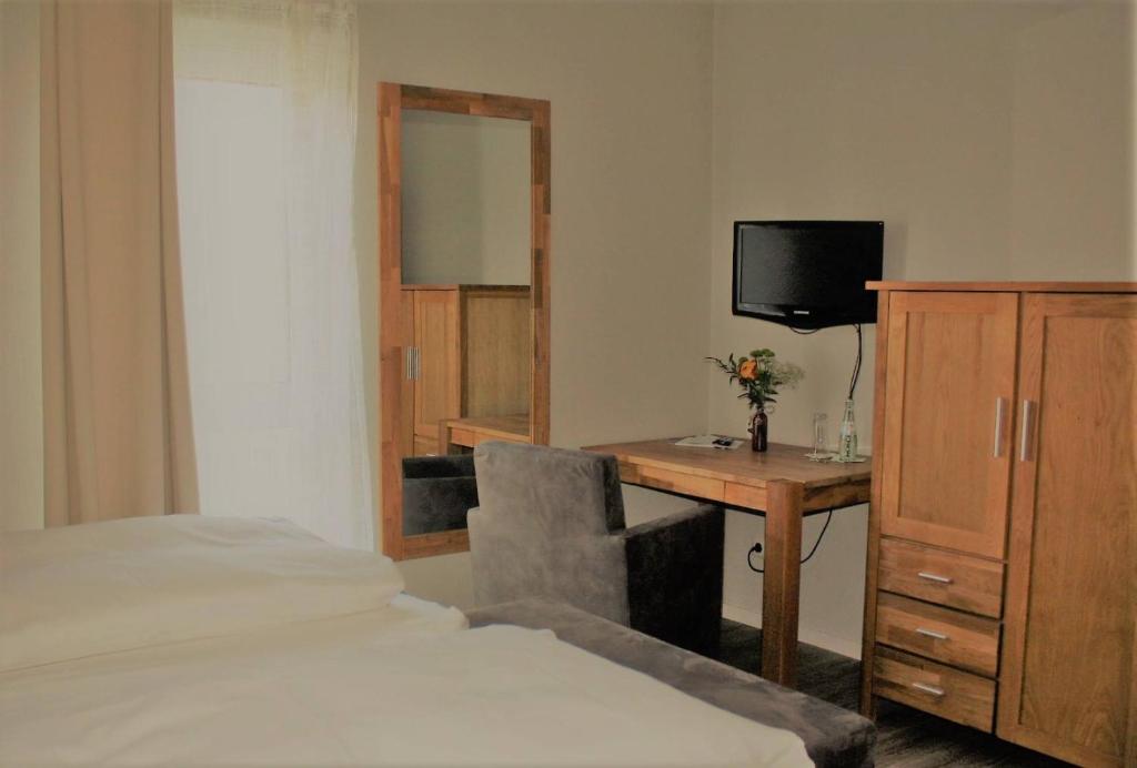 TV a/nebo společenská místnost v ubytování Hotel Schöne Aussicht