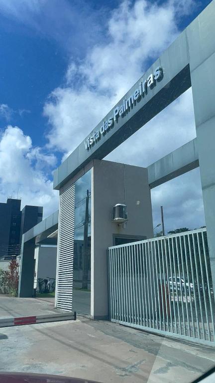 a building with a sign that reads very use palmetername at Cobertura em Condominio no Planalto in Manaus