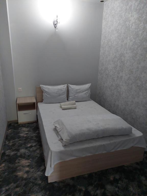 Postel nebo postele na pokoji v ubytování Sevan EM & YU