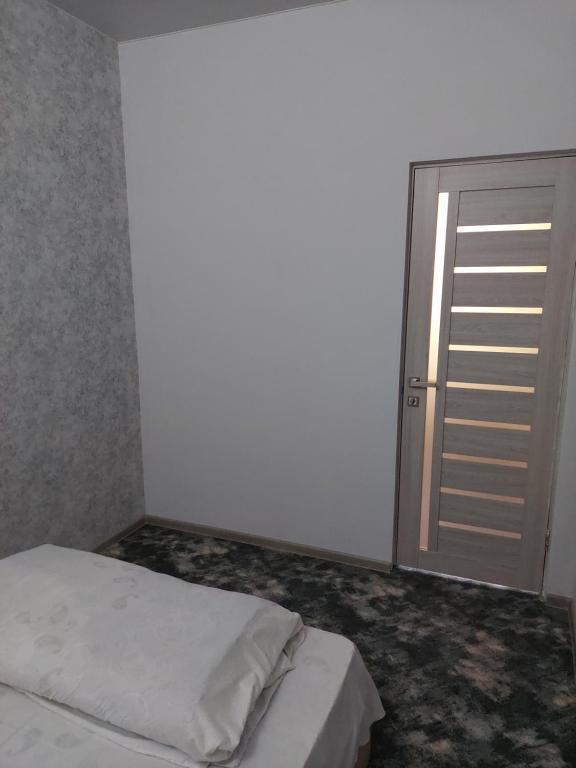 Postel nebo postele na pokoji v ubytování Sevan EM & YU