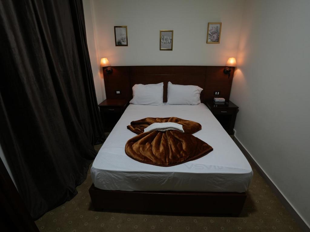 Postel nebo postele na pokoji v ubytování Montana Hotel