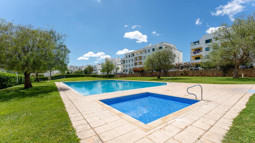 Vila Nova Sunny 2BR Apt with Pool by LovelyStay