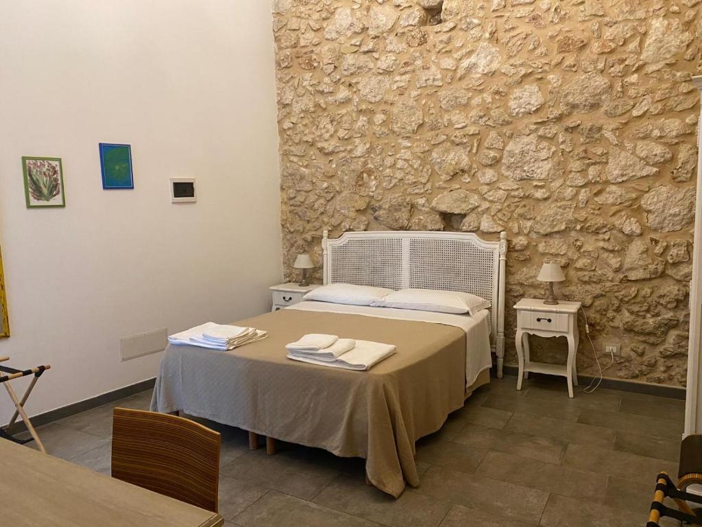Postel nebo postele na pokoji v ubytování Corte Sicula