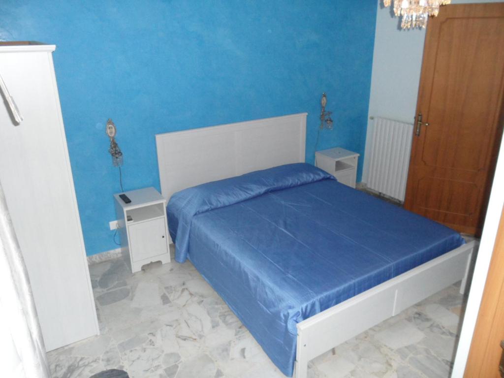 A bed or beds in a room at IL B&B Maison Graziella