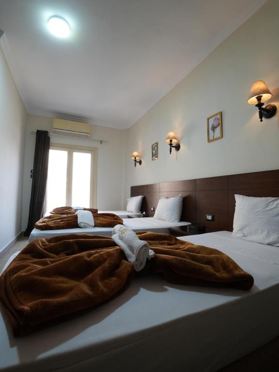 Postel nebo postele na pokoji v ubytování Montana Hotel