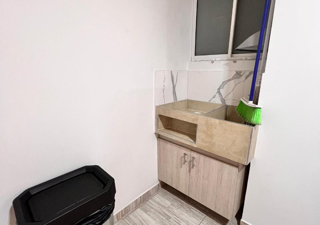 Kuchyň nebo kuchyňský kout v ubytování PARK 66 Apartaestudios