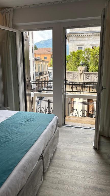 Voodi või voodid majutusasutuse Albergo Cappello e Cadore toas