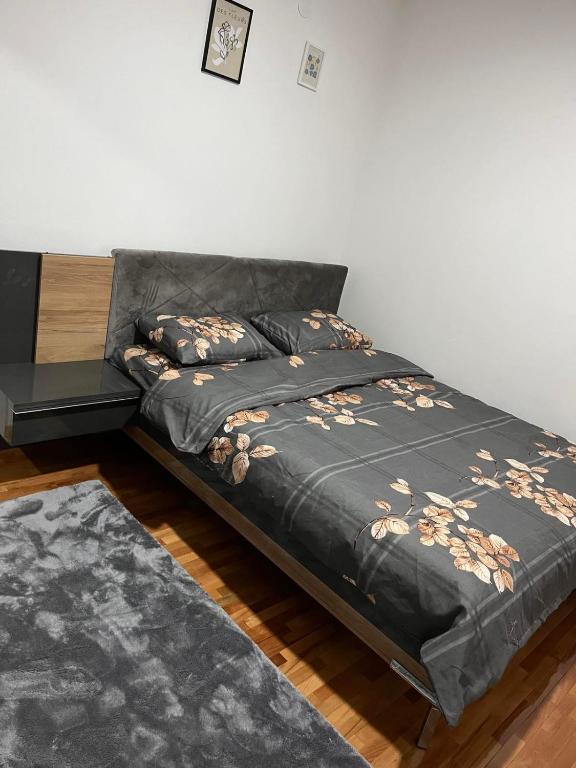 Postel nebo postele na pokoji v ubytování Apartman Amfora Vranje