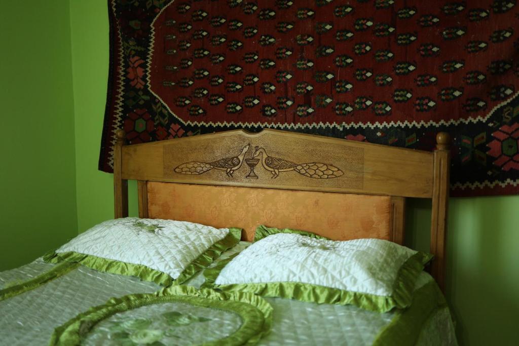 Postel nebo postele na pokoji v ubytování Papi Aygi