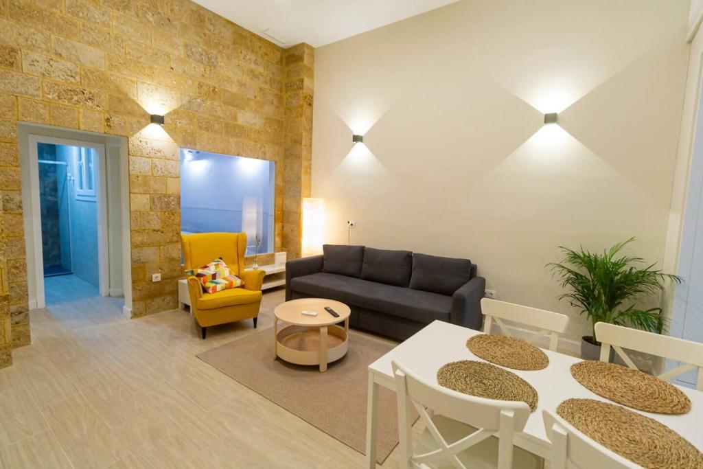 Posezení v ubytování SH Casa Candelaria Apartamento en el centro