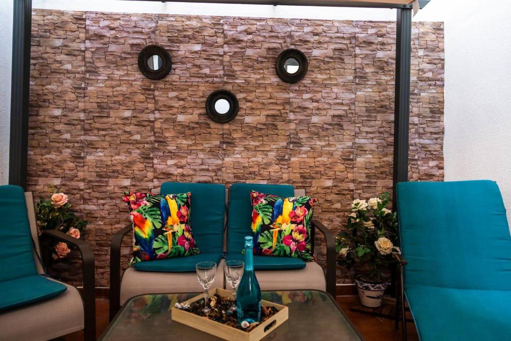 Posezení v ubytování SH Pilucas Home Moderno apartamento con patio
