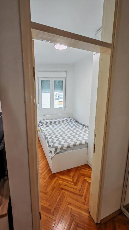 Postel nebo postele na pokoji v ubytování Brod Trgovacka