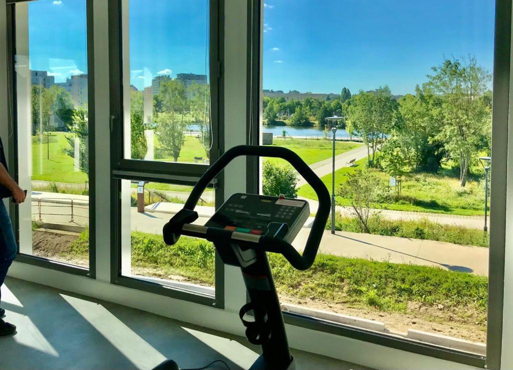 Posilňovňa alebo fitness centrum v ubytovaní Le Rio, appartement avec terrasse & parking