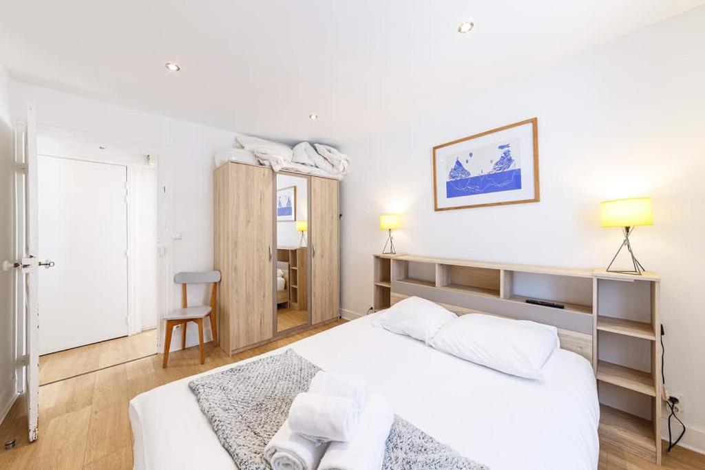 Posteľ alebo postele v izbe v ubytovaní Le Magenta, appartement 2 chambres, proche plage
