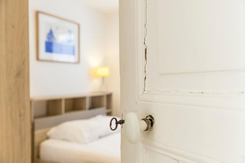 Posteľ alebo postele v izbe v ubytovaní Le Magenta, appartement 2 chambres, proche plage