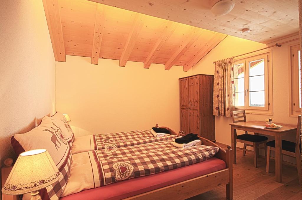 Postel nebo postele na pokoji v ubytování B&B Panorama
