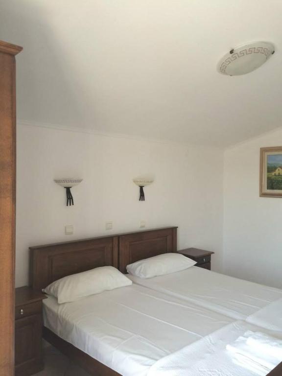 Postel nebo postele na pokoji v ubytování Gogas Palace