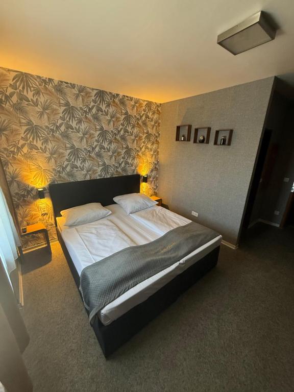 Postel nebo postele na pokoji v ubytování Parkhotel Lindenhof - KOSTENLOSE PARKPLÄTZE