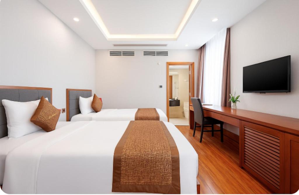 Postel nebo postele na pokoji v ubytování Mercury Boutique Hotel