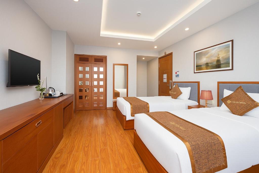 Postel nebo postele na pokoji v ubytování Mercury Boutique Hotel