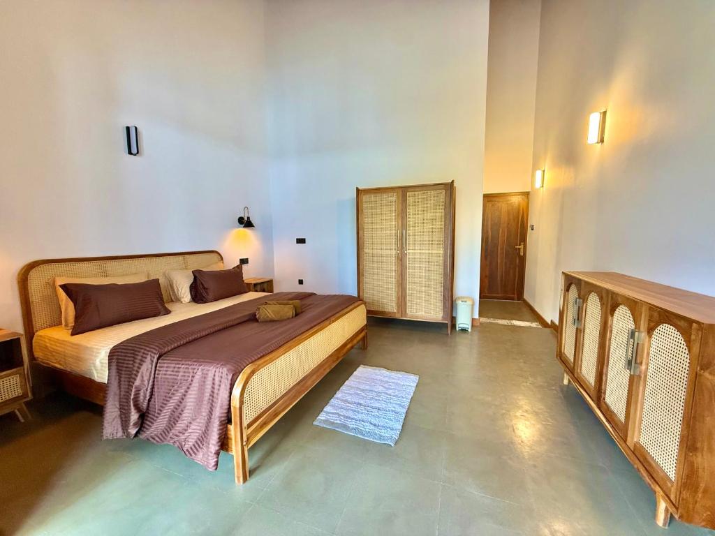 Postel nebo postele na pokoji v ubytování Ella Inn Hotel