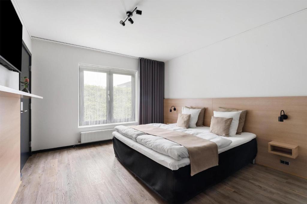 Postel nebo postele na pokoji v ubytování Best Western Plus Hotel Odense