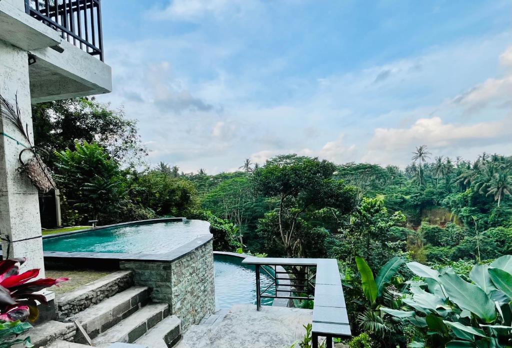 Bazén v ubytování D'Nanda mini hotel Ubud nebo v jeho okolí