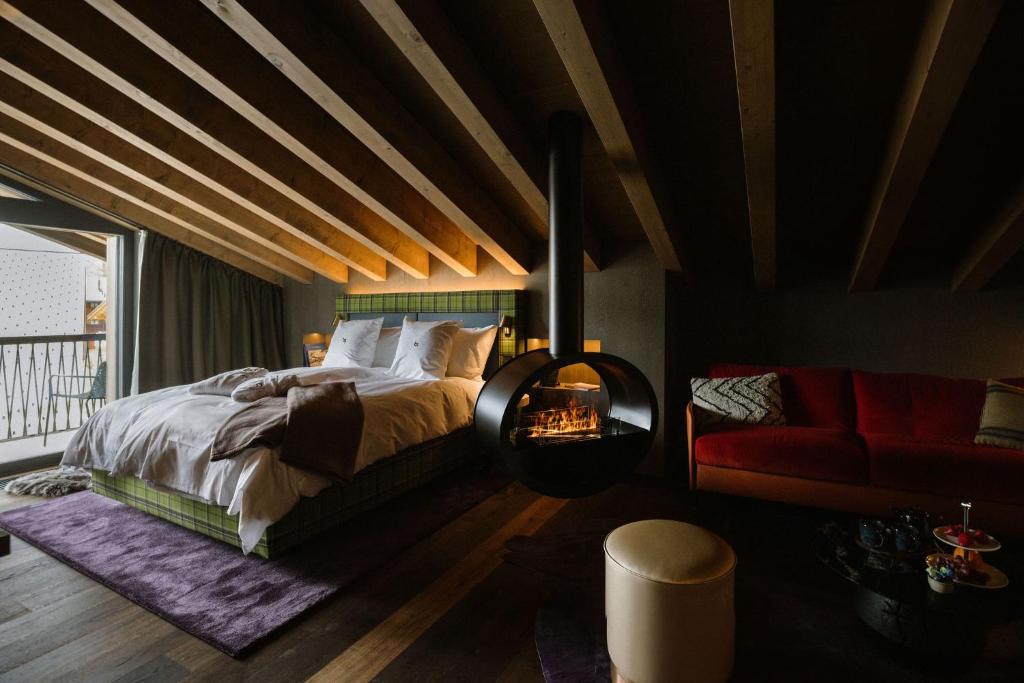Postel nebo postele na pokoji v ubytování Bergwelt Grindelwald - Alpine Design Resort