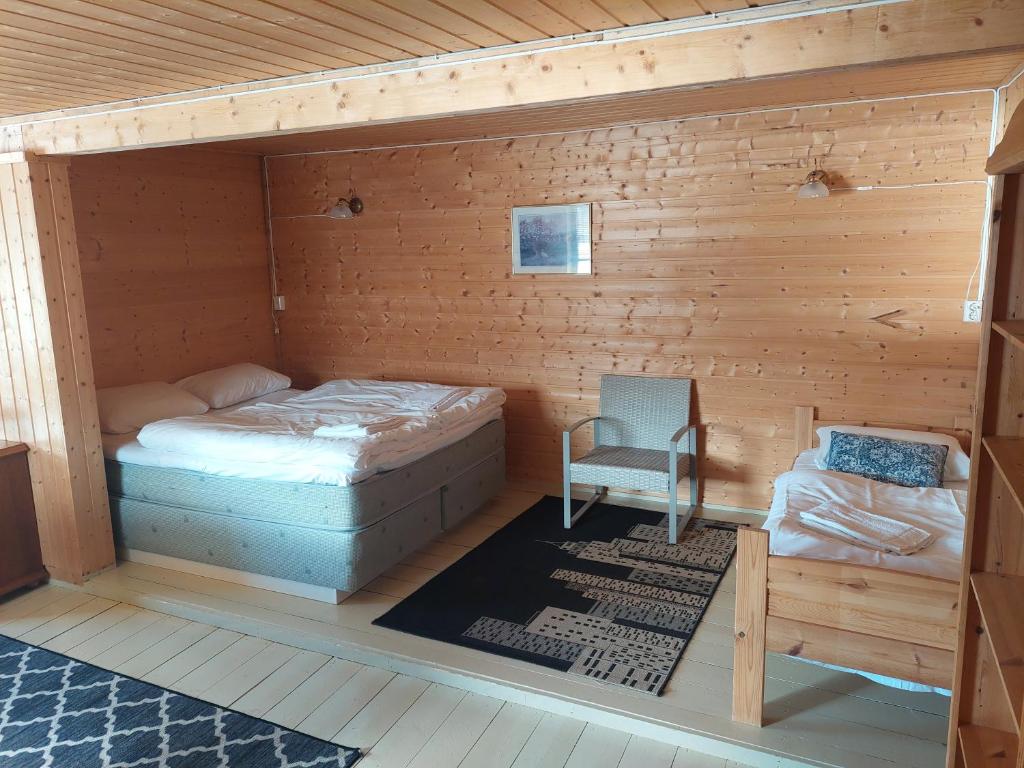 Postel nebo postele na pokoji v ubytování Vaterfjord Brygge