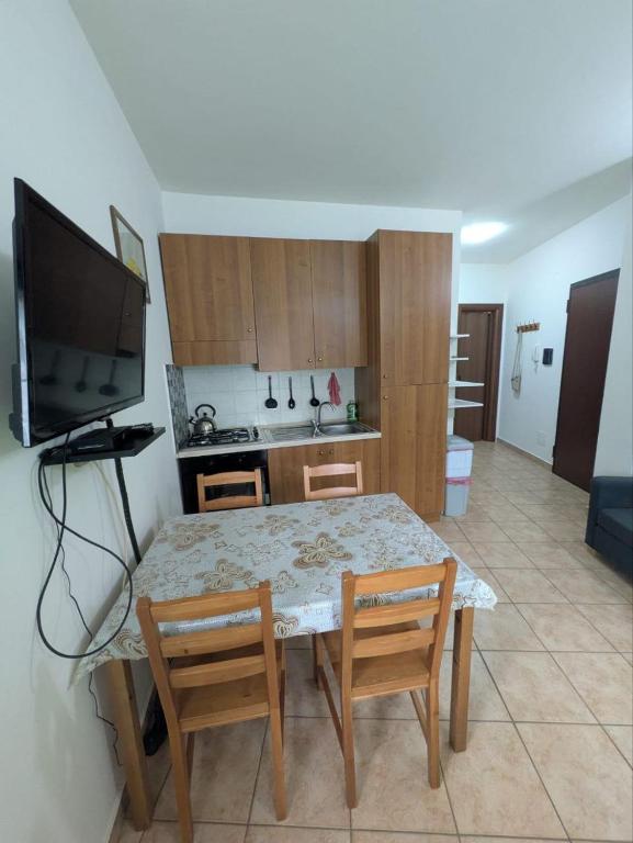 Kuchyň nebo kuchyňský kout v ubytování Lorica Apartment Residence LagoSila
