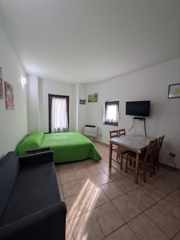TV a/nebo společenská místnost v ubytování Lorica Apartment Residence LagoSila