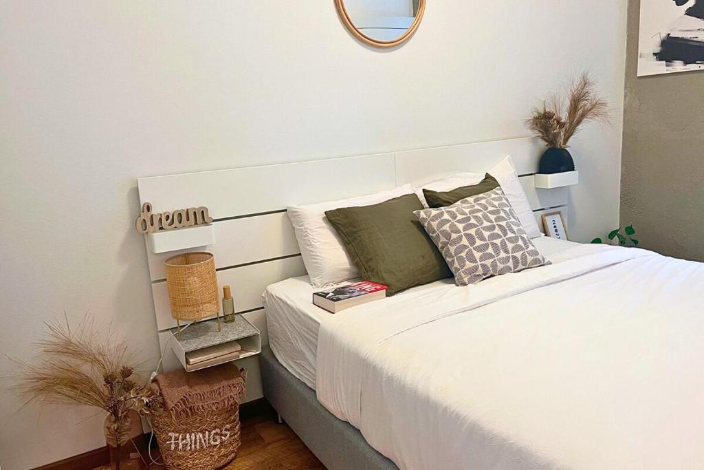 Postel nebo postele na pokoji v ubytování Classy Central airport apartment