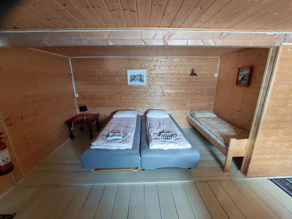 Postel nebo postele na pokoji v ubytování Vaterfjord Brygge