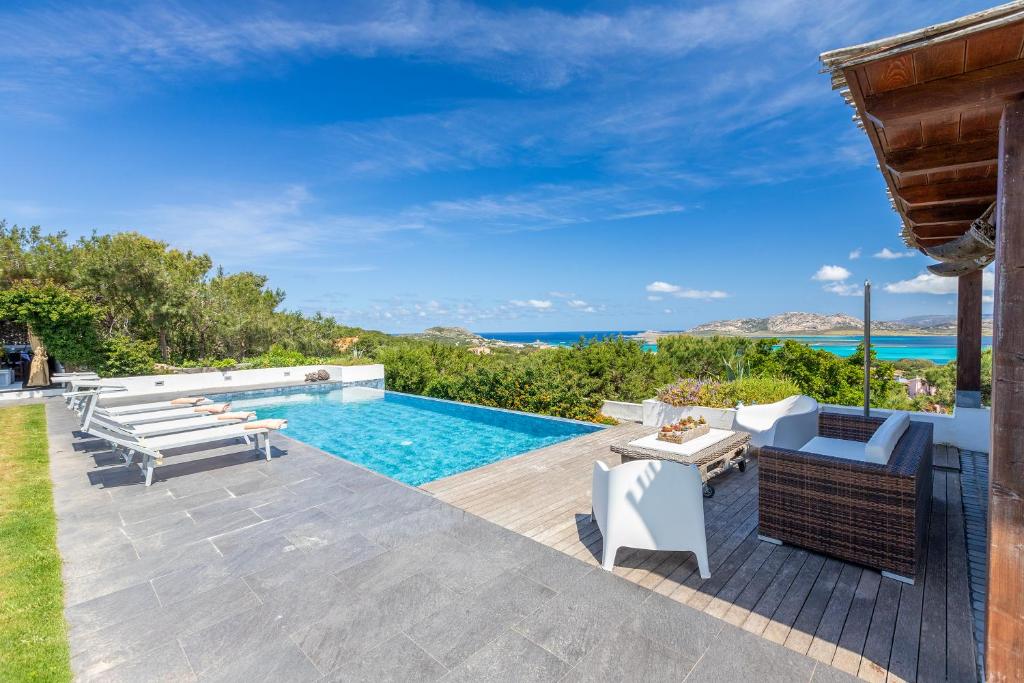 an image of a swimming pool in a villa at Villa Altxor in Stintino