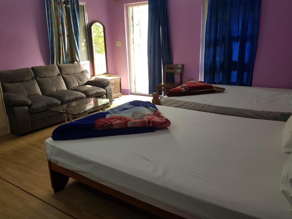 Postel nebo postele na pokoji v ubytování Hotel 21