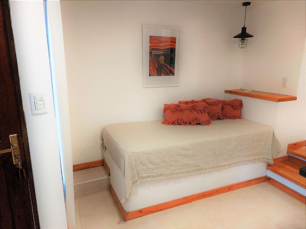 Una cama o camas en una habitación de Soles Blancos Serranita