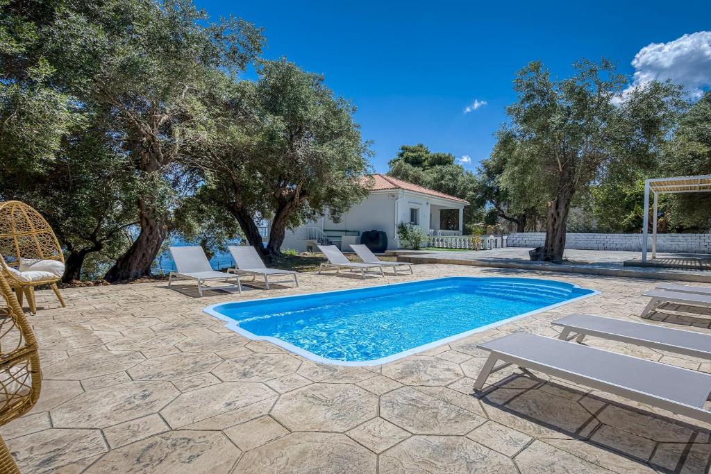 Πισίνα στο ή κοντά στο Villa Ninemia Seaview by Estia