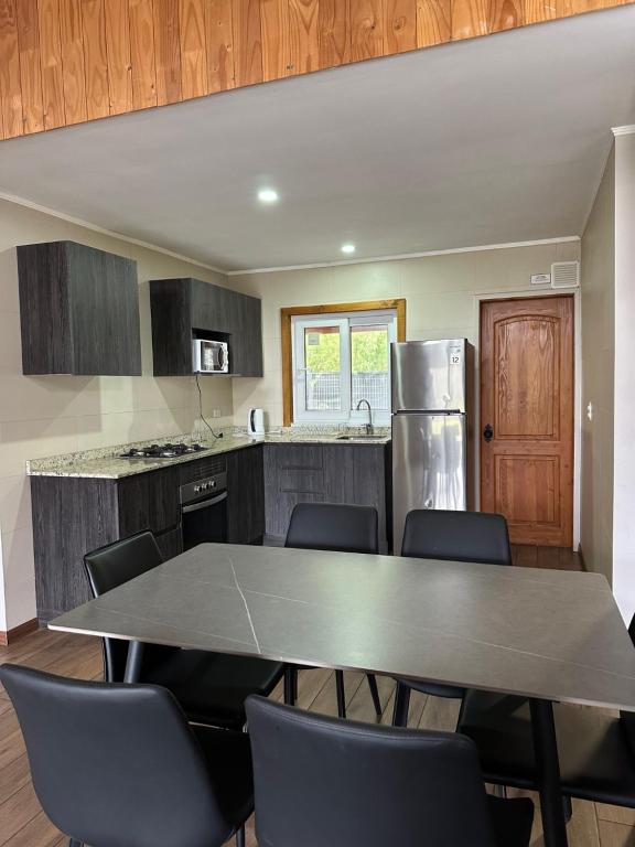 Una cocina o zona de cocina en Petruleufu