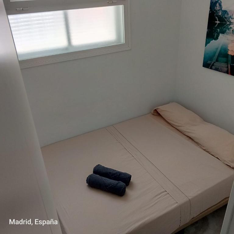 Postel nebo postele na pokoji v ubytování Hospedaje La Campana