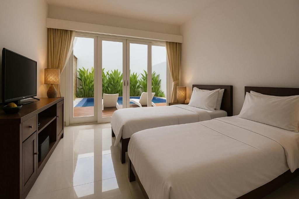 Postel nebo postele na pokoji v ubytování Lumiere Hotel Gili Trawangan