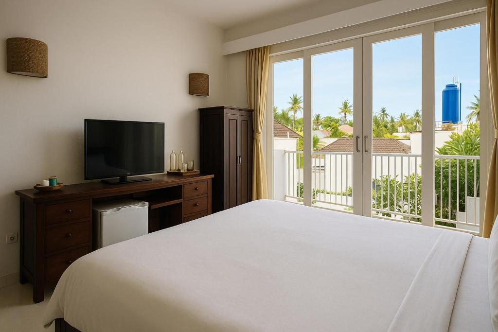 Postel nebo postele na pokoji v ubytování Lumiere Hotel Gili Trawangan